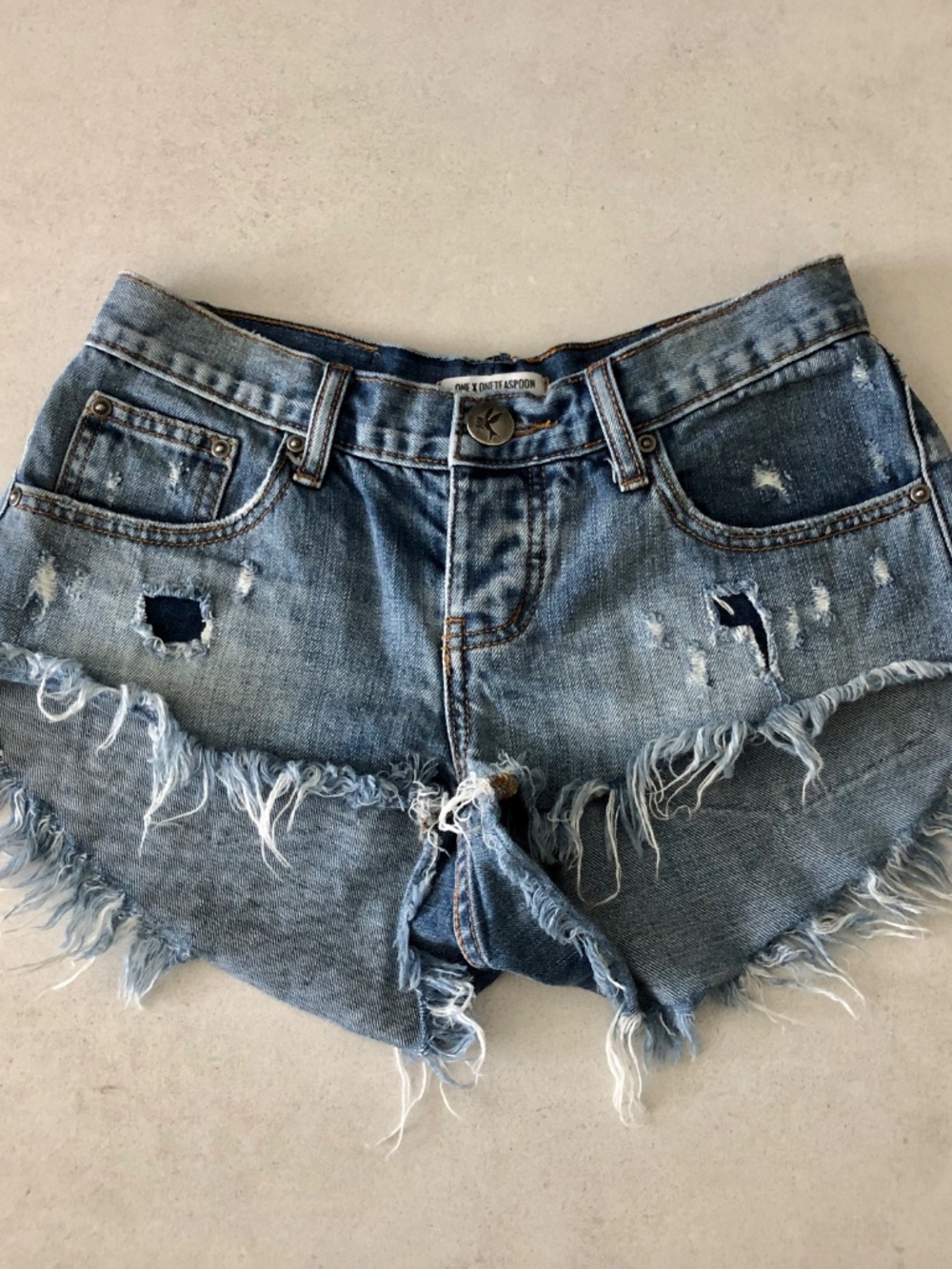 One Teaspoon Low Waist Distressed Denim Cutoff Shorts, size 25